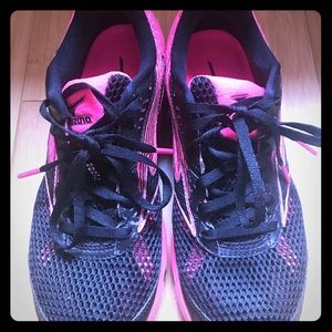 Black and neon pink Mizuno sneakers